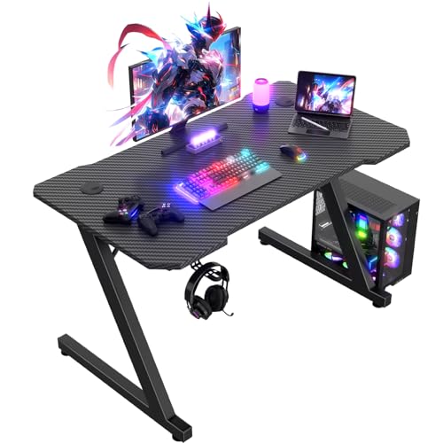 JUMMCO Bureau gaming avec porte-gobelet et porte-casque Table de jeu avec 2 trous professionnels pour le passage des câbles, plateau en fibre de carbone, cadre en métal noir de haute qualité 100x60 cm